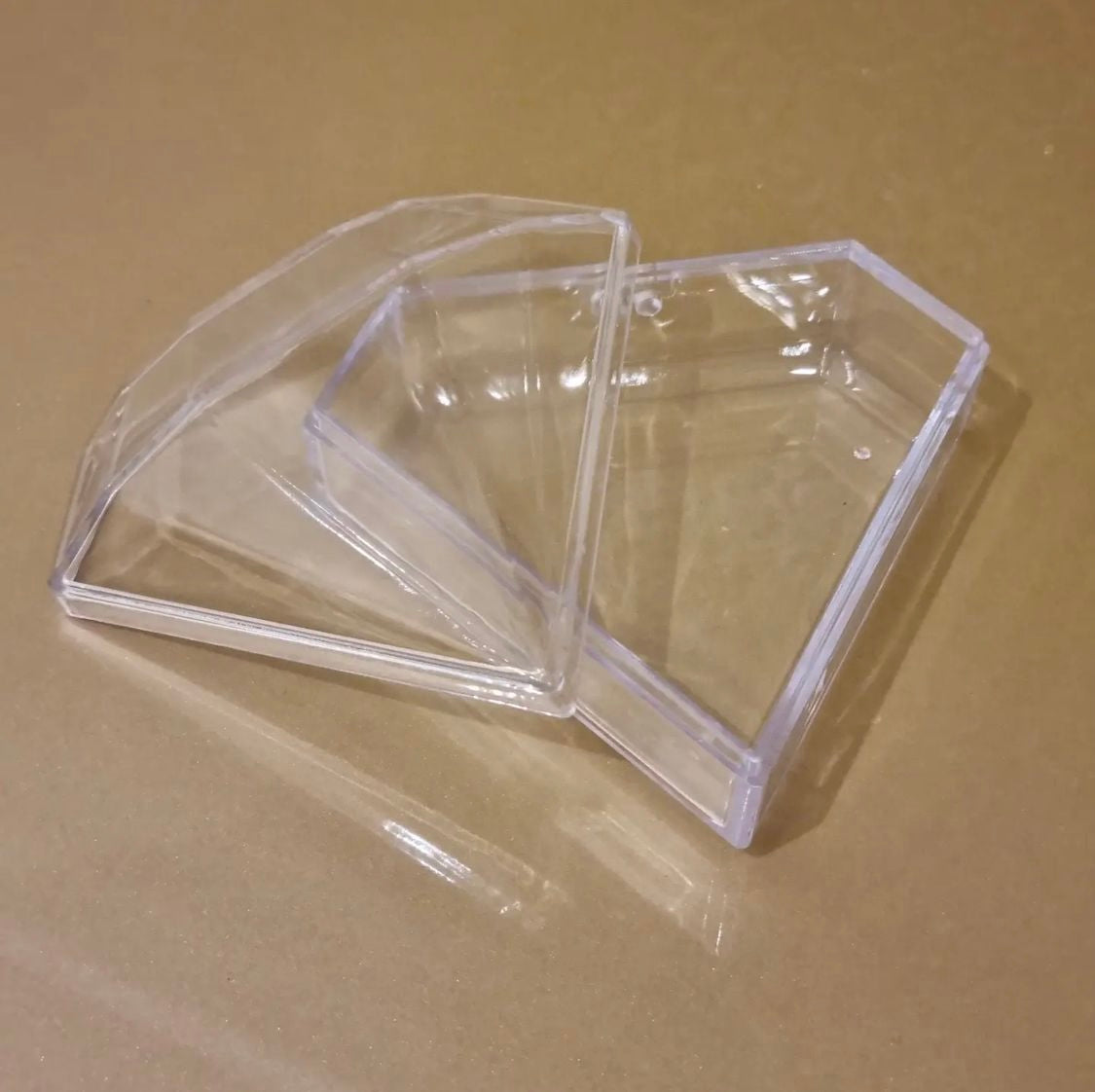 Diamantvormige plastiekhouer